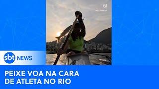 Remadora leva 'peixada' na Lagoa Rodrigo de Freitas, no Rio