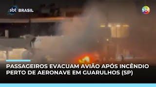 Avião é evacuado às pressas após incêndio próximo a aereonave em Guarulhos (SP)