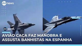 Caça da Aeronáutica assusta banhistas ao desviar de pássaros durante manobra na Espanha | #SBTBrasil