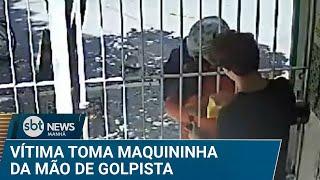 Flagra: Vítima toma maquininha de cartão da mão de golpista | #SBTNews Manhã (10/03/25)