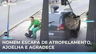 Homem escapa por pouco de atropelamento e se ajoelha em oração após susto; veja vídeo | #SBTBrasil