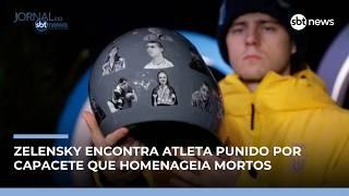 Zelenskyy encontra atleta punido por homenagem a mortos da guerra em capacete | #JornaldoSBTNews