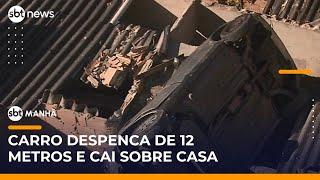 Motorista perde controle e carro cai sobre telhado de casa | #SBTManhã (03/06/25)