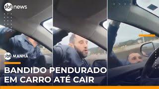 Flagra: Homem tenta invadir carro em movimento e se pendura na janela | #SBTManhã