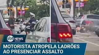 Motorista vê assalto a motociclista e atropela criminosos | #SBTNews Manhã (26/12/24)