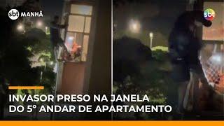 Ladrão “Homem-Aranha” tenta invadir apartamento no 5º andar e fica preso em janela | #SBTManhã