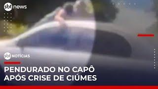 Flagra: Homem se pendura em para-brisa por crise de ciúmes no DF | #SBTNotícias