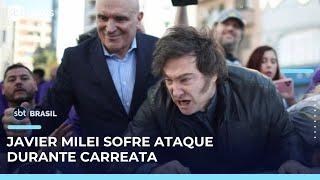 Milei é retirado às pressas de carreata após ataque com pedras em Buenos Aires | #SBTBrasil 