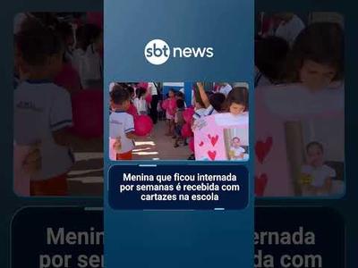 Menina que ficou internada por semanas é recebida com cartazes na escola