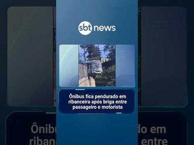 Ônibus fica pendurado em ribanceira após briga entre passageiro e motorista | #SBTNotícias
