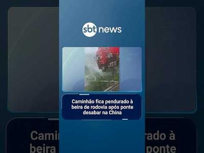 Caminhão fica pendurado à beira de rodovia após ponte desabar na China | #SBTNotícias