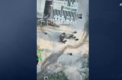 Drone flagra traficantes armados surpreendidos por PMs em área de mata no Rio