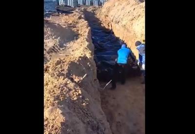 Guerra na Ucrânia: civis são enterrados em cova coletiva em Bucha
