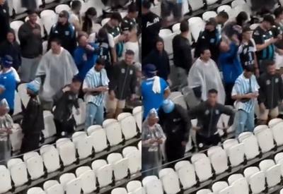 Vídeo: torcedor do Racing é flagrado fazendo gestos racistas durante jogo contra o Corinthians