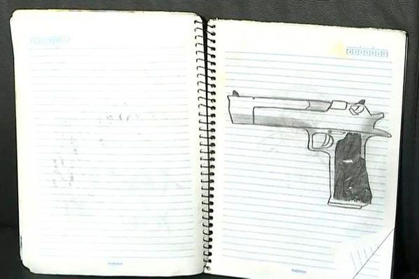 Imagem da noticia Caderno de um dos atiradores traz desenho de arma e táticas de ataque