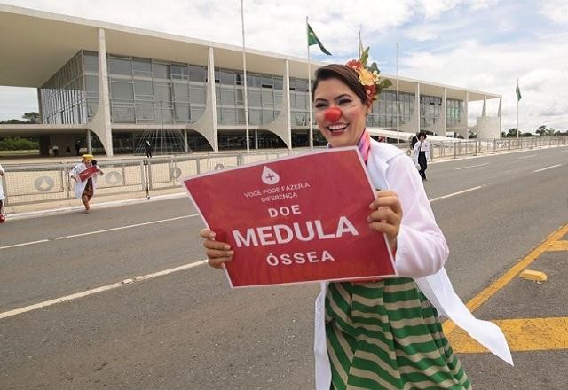 Imagem da noticia Michelle Bolsonaro se fantasia de palhaço em ato por doação de medula
