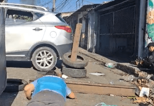 Imagem da noticia Repórter do SBT deita no chão para se proteger de tiros durante gravação no Rio