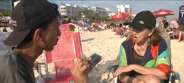 Imagem da noticia  Jovem confeiteiro do Rio de Janeiro conquista turistas com habilidades linguísticas