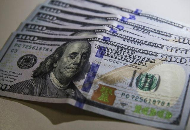 Imagem da noticia Dólar encerra último pregão do ano a R$ 6,1797 após leilão do BC 