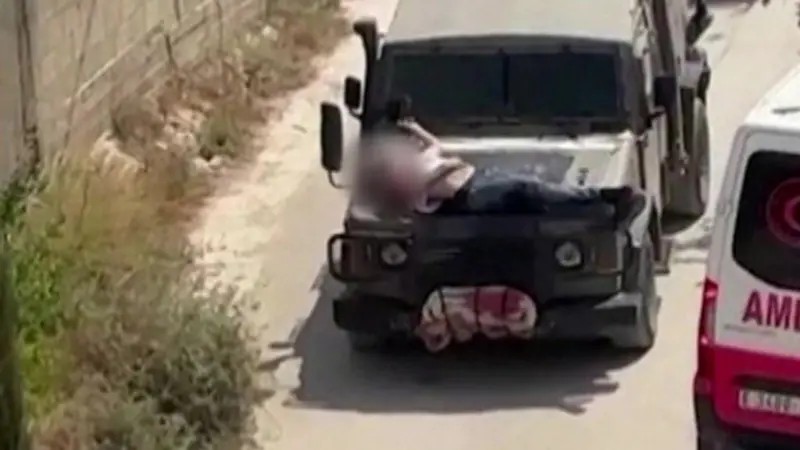Imagem da noticia VÍDEO: Militares de Israel amarram palestino ferido ao capô de jipe na Cisjordânia