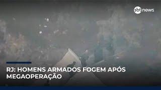 Vídeo flagra homens armados fugindo da Vila Cruzeiro após megaoperação no Rio de Janeiro Vídeo flagra homens armados fugindo da Vila Cruzeiro após megaoperação no Rio de Janeiro