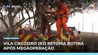 Rotina começa a ser retomada na Vila Cruzeiro, no Rio, após megaoperação Rotina começa a ser retomada na Vila Cruzeiro, no Rio, após megaoperação