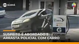 Flagra: Suspeito tenta fugir e arrasta policial com carro em posto de gasolina | #SBTManha Flagra: Suspeito tenta fugir e arrasta policial com carro em posto de gasolina | #SBTManha