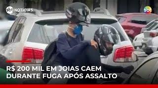 Criminosos roubam mais de R$ 600 mil, mas deixam parte das joias cair na fuga | #SBTNotícias Criminosos roubam mais de R$ 600 mil, mas deixam parte das joias cair na fuga | #SBTNotícias