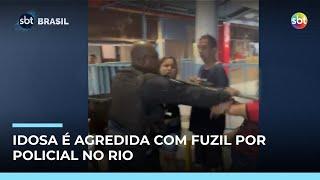 PM é flagrado agredindo idosa com fuzil no Rio; caso é investigado PM é flagrado agredindo idosa com fuzil no Rio; caso é investigado