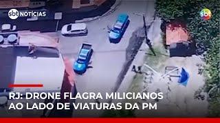 Drone flagra milicianos ao lado de viaturas da PM no Rio | #SBTNotícias Drone flagra milicianos ao lado de viaturas da PM no Rio | #SBTNotícias