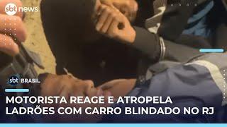 Motorista de carro blindado reage a assalto e atropela ladrões no Jardim Botânico no RJ| #SBTBrasil Motorista de carro blindado reage a assalto e atropela ladrões no Jardim Botânico no RJ| #SBTBrasil