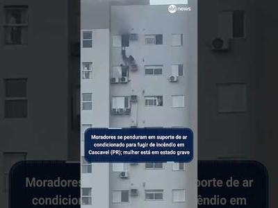 Moradores se penduram em suporte de ar condicionado para fugir de incêndio em Cascavel (RS) Moradores se penduram em suporte de ar condicionado para fugir de incêndio em Cascavel (RS)