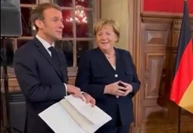 Imagem da noticia Macron condecora Angela Merkel com mais alta distinção da França