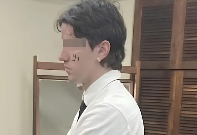 Imagem da noticia MP denuncia estudante que tentou se formar com suástica desenhada no rosto