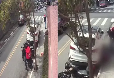 Câmera registra momento em que PM é baleado no peito em assalto na Grande SP Câmera registra momento em que PM é baleado no peito em assalto na Grande SP