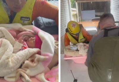 VÍDEO: Recém-nascida é resgatada às pressas com banheira em Canoas, no Rio Grande do Sul