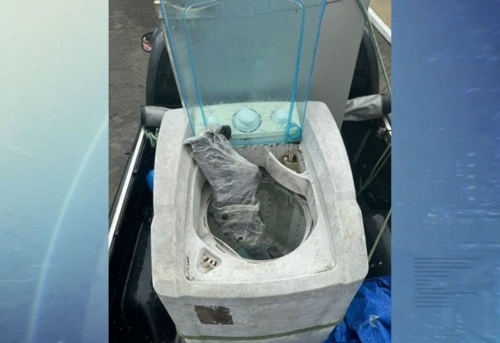 Imagem da noticia Fuzil é encontrado escondido dentro de máquina de lavar roupas